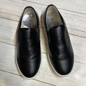Michael Kors big girls slip on casual shoes. Black/silver. Size 4